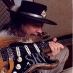 Stevie Ray Vaughan bite his guitar